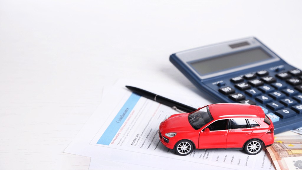 photo of a calculator and car